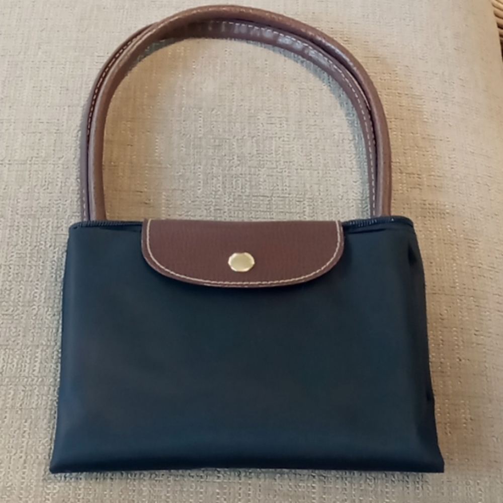Totes expandable bag great travel or get-aways rainproof